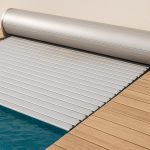 automatic pool cover partially closed on a deck beside a pool
